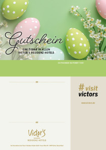 Auf dem Gutschein sind auf einem grünen Hintergrund Ostereier in verschiedenen frühlingshaften Farben.