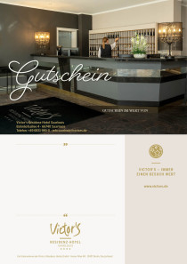 Der Empfangstresen in der Lobby empfängt sie in schlichter Eleganz.